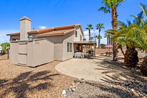 West side yard with large storage shed!