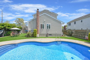 Back view of home from Salt Water Pool
