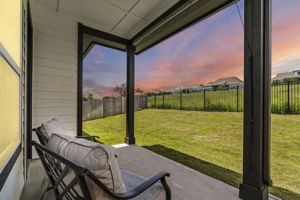 Relax and enjoy the hill country sunsets from the covered patio.