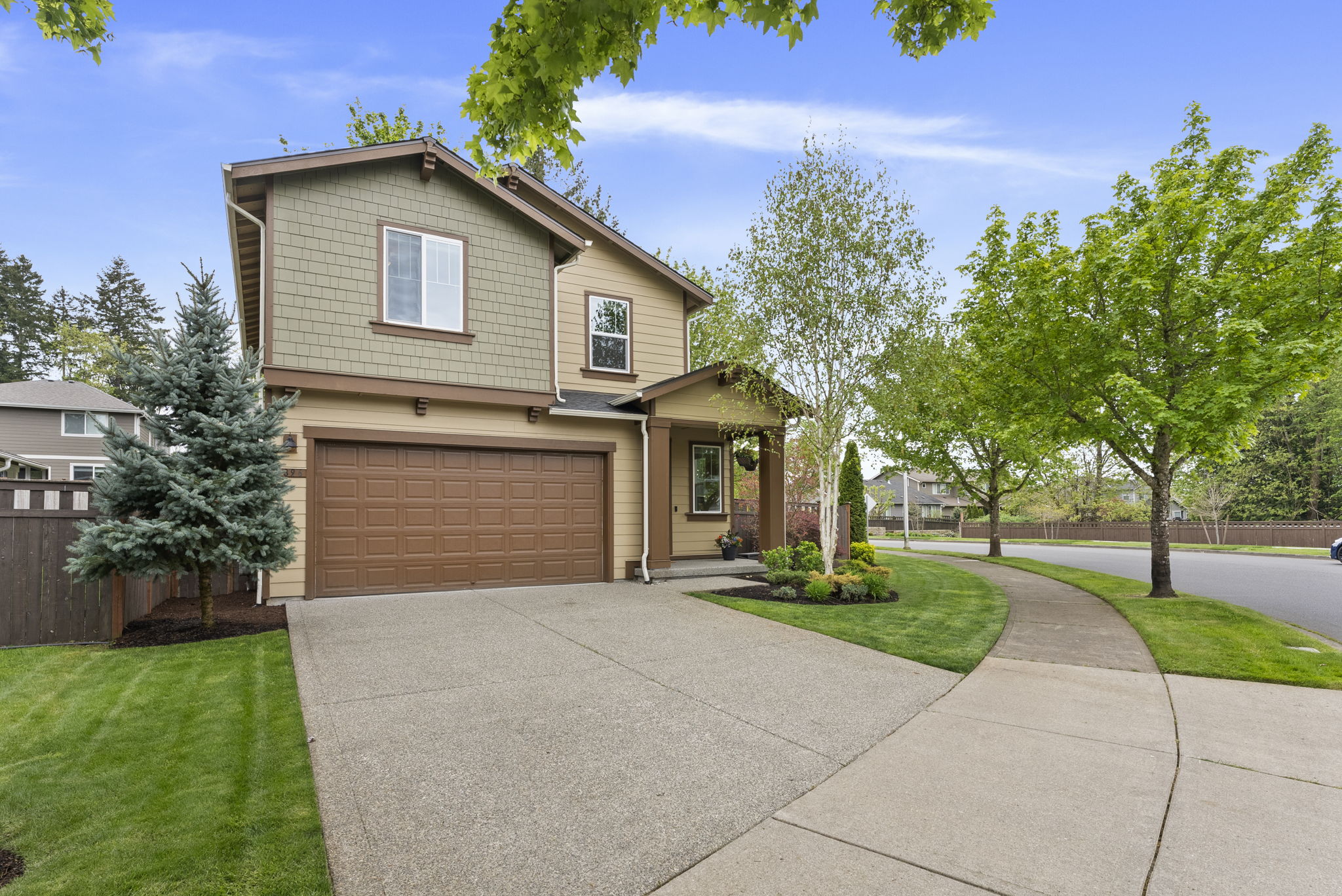 Nestled on a cozy corner lot, offering a warm and welcoming feel