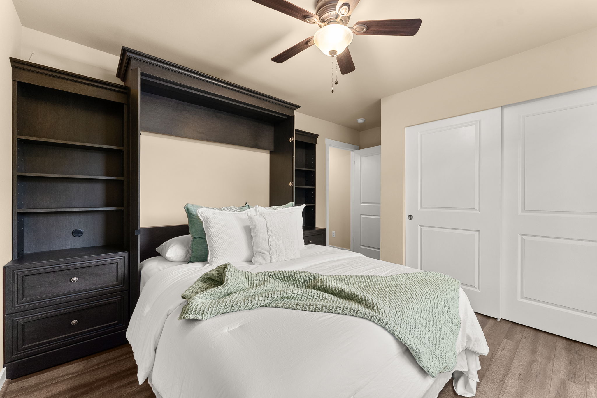 Elegant Murphy bed with integrated storage enhances both style and functionality