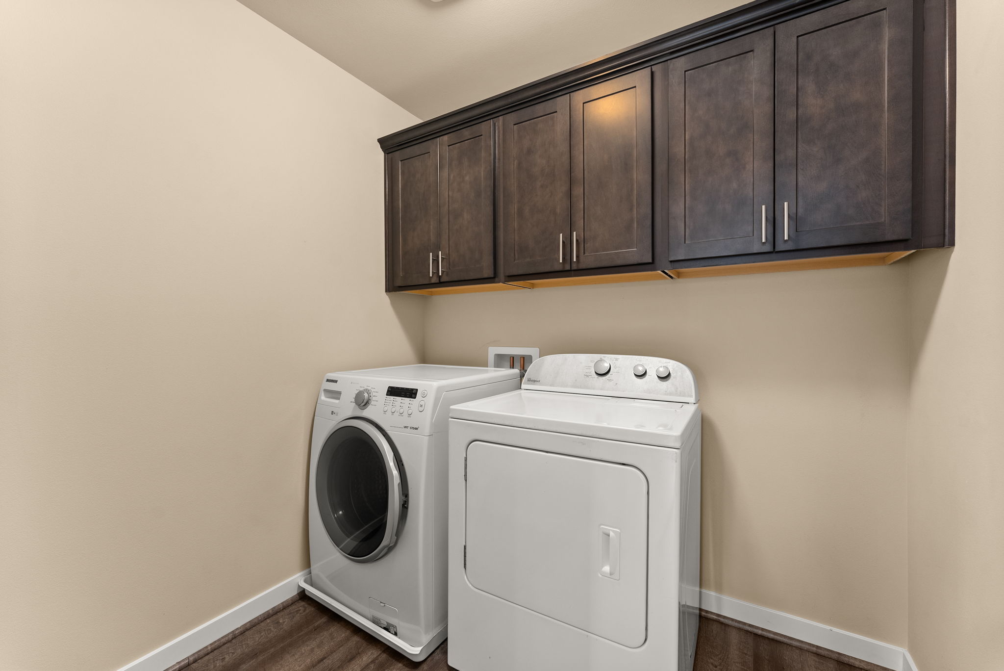 Generously sized upstairs laundry room for added convenience