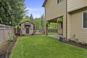 Thoughtfully maintained backyard offering a high level of privacy