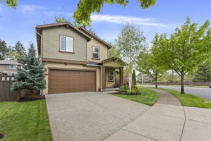 Nestled on a cozy corner lot, offering a warm and welcoming feel