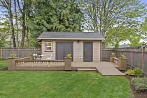 Workshop enhanced with low-maintenance Trex® decking and French doors for easy access