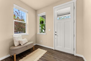 Welcoming entryway with room for a bench or sitting area for added convenience