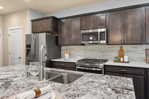 Kitchen is also equipped with pantry storage