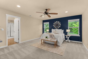 Expansive primary suite with peaceful backyard views and a 5-piece ensuite