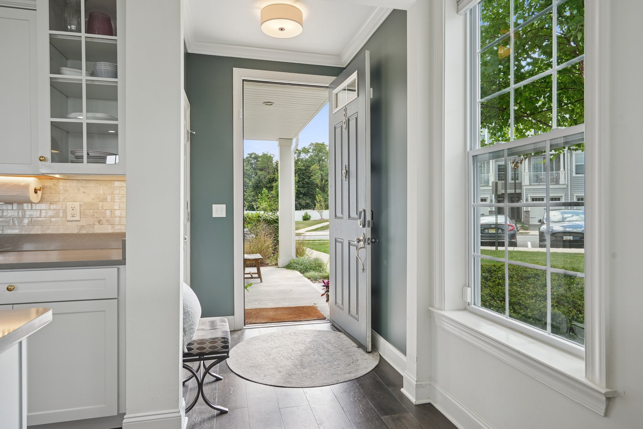 This particular unit is additionally revered for it's street level entry on the 1st floor and meadow level entry from the sliding doors downstairs.