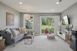 A lower level with endless purpose! Sliders open to the patio extending living space and offering a private escape.