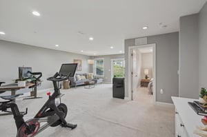 Space to stretch out. The expansive lower-level family room adapts for movies, fitness, or everyday play.