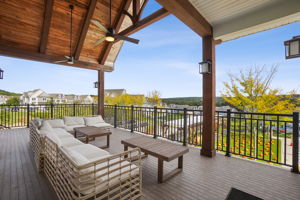Great veranda off the back of the clubhouse. This modern condo community offers trails, parks, and lovely views.