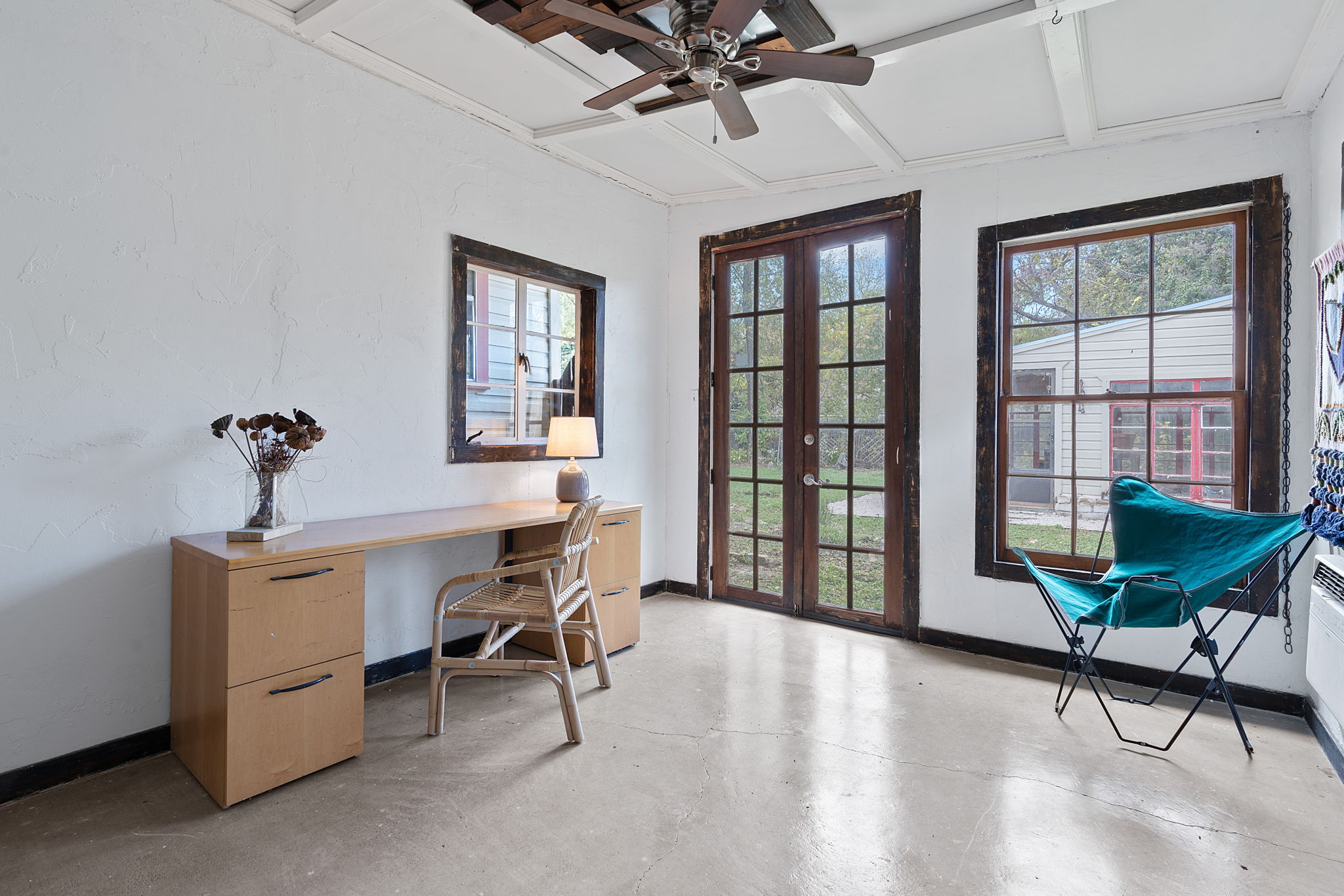 The bonus space on the other side of the carport is used as an office.  Not part of the square footage.