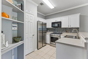 Kitchen updated  with a Pantry and custom shelving