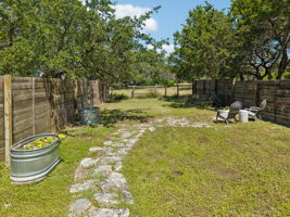 Private Backyard is fenced with views of the Ranch.
