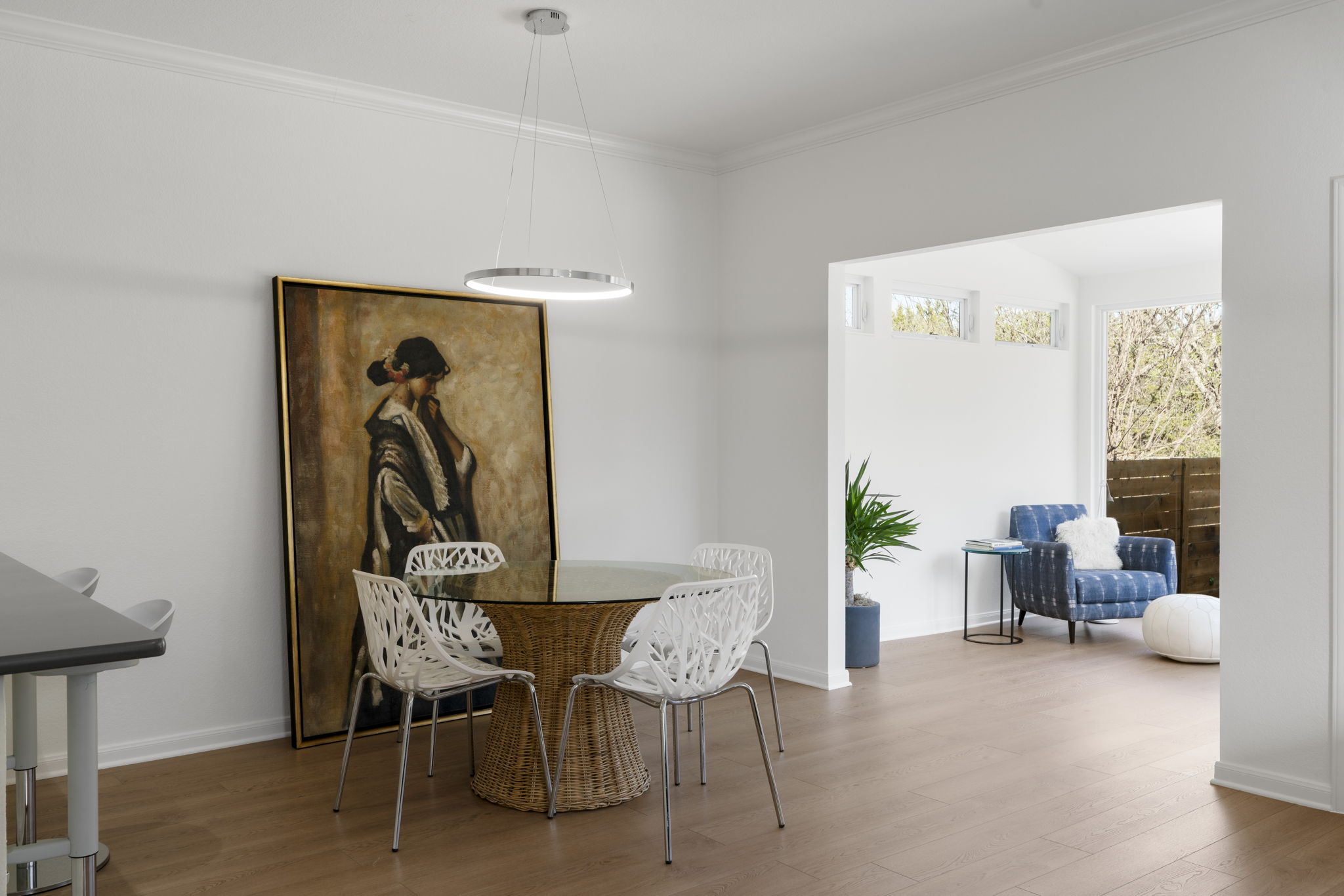 Spacious Dining Room with designer light fixtures