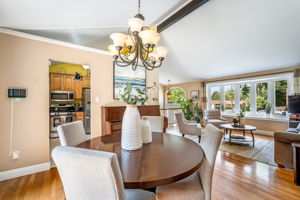 Open living/dining room with vaulted ceiling