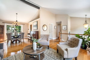 Open living/dining room with vaulted ceiling