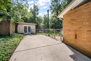 Expansive driveway and storage sheds