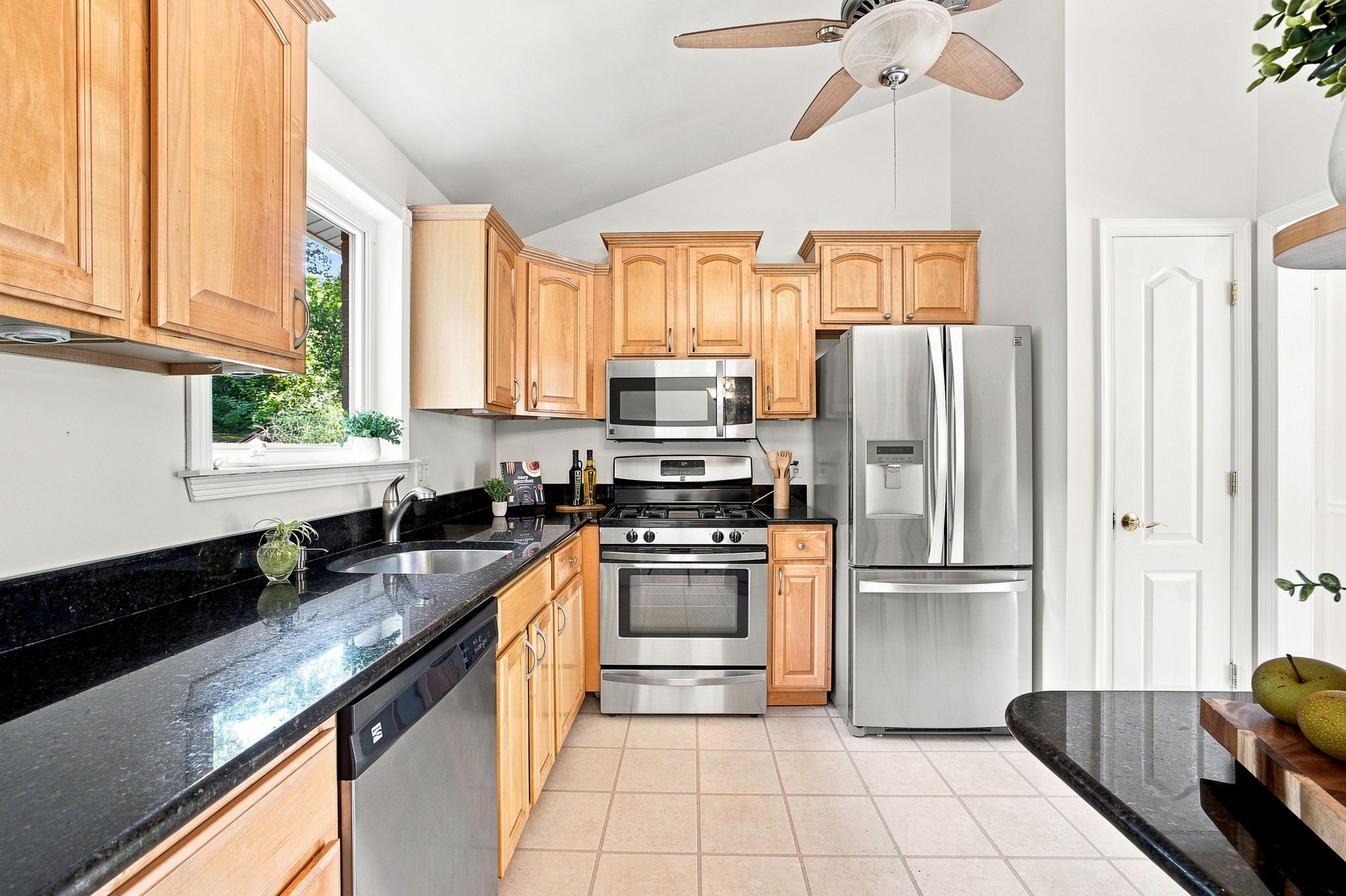 Updated kitchen with granite, stainless & breakfast bar!