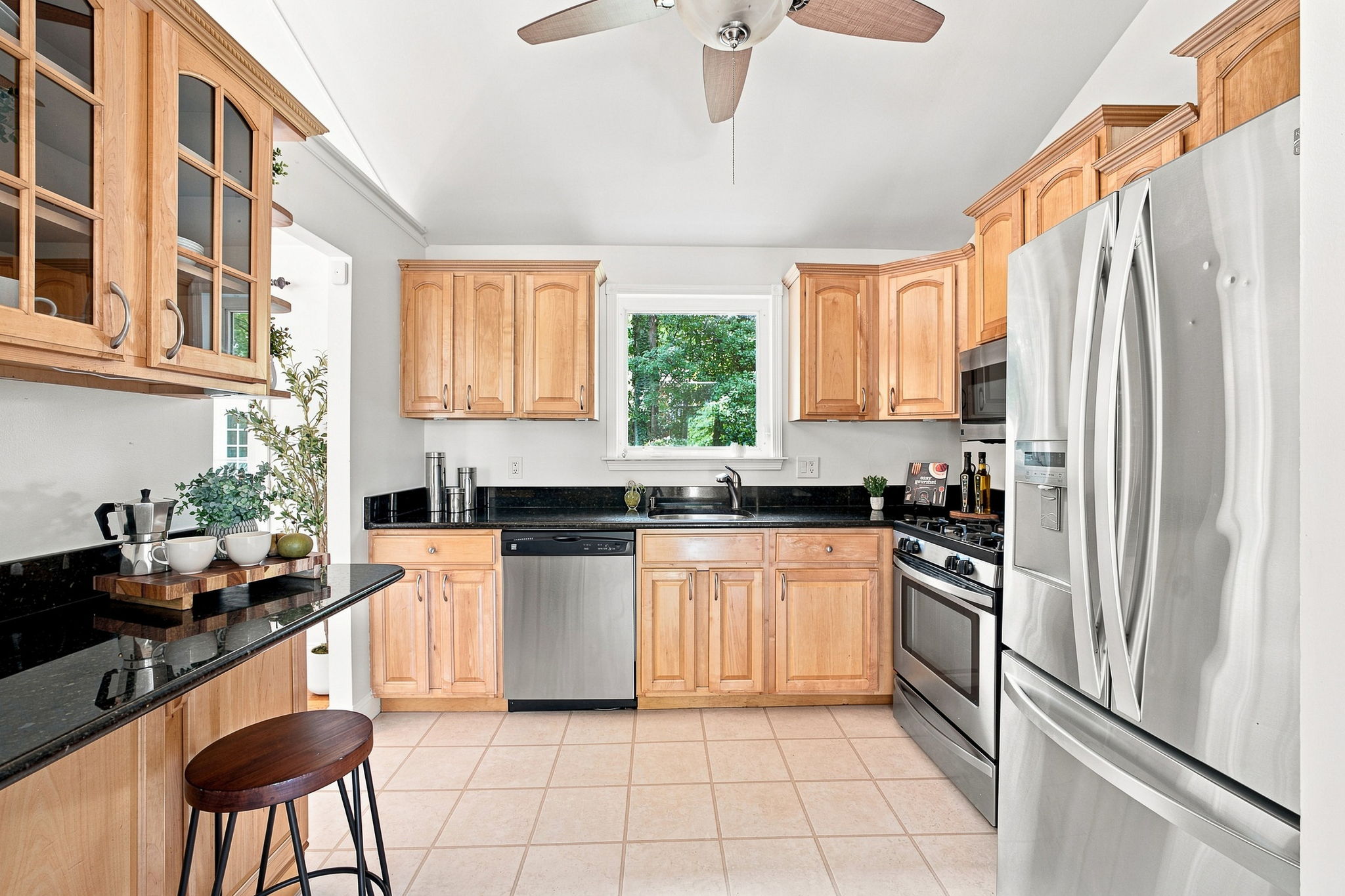 Updated kitchen with granite, stainless & breakfast bar!
