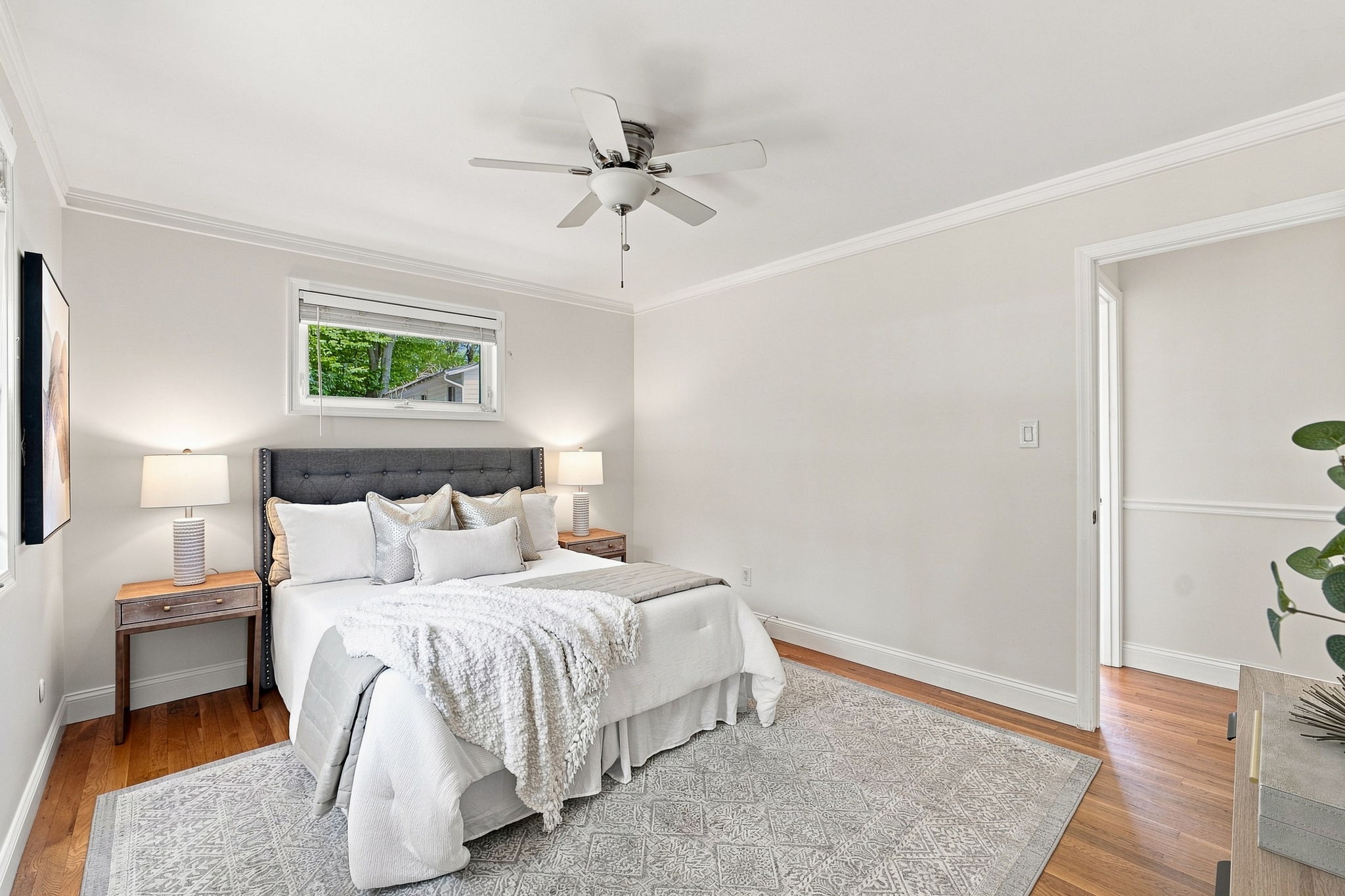 Ensuite primary bedroom with walk-in closet