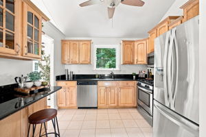 Updated kitchen with granite, stainless & breakfast bar!