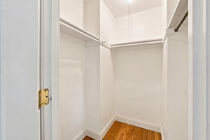 Walk-in closet in primary bedroom