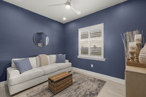 Den with sleeper sofa accommodates overflow guests