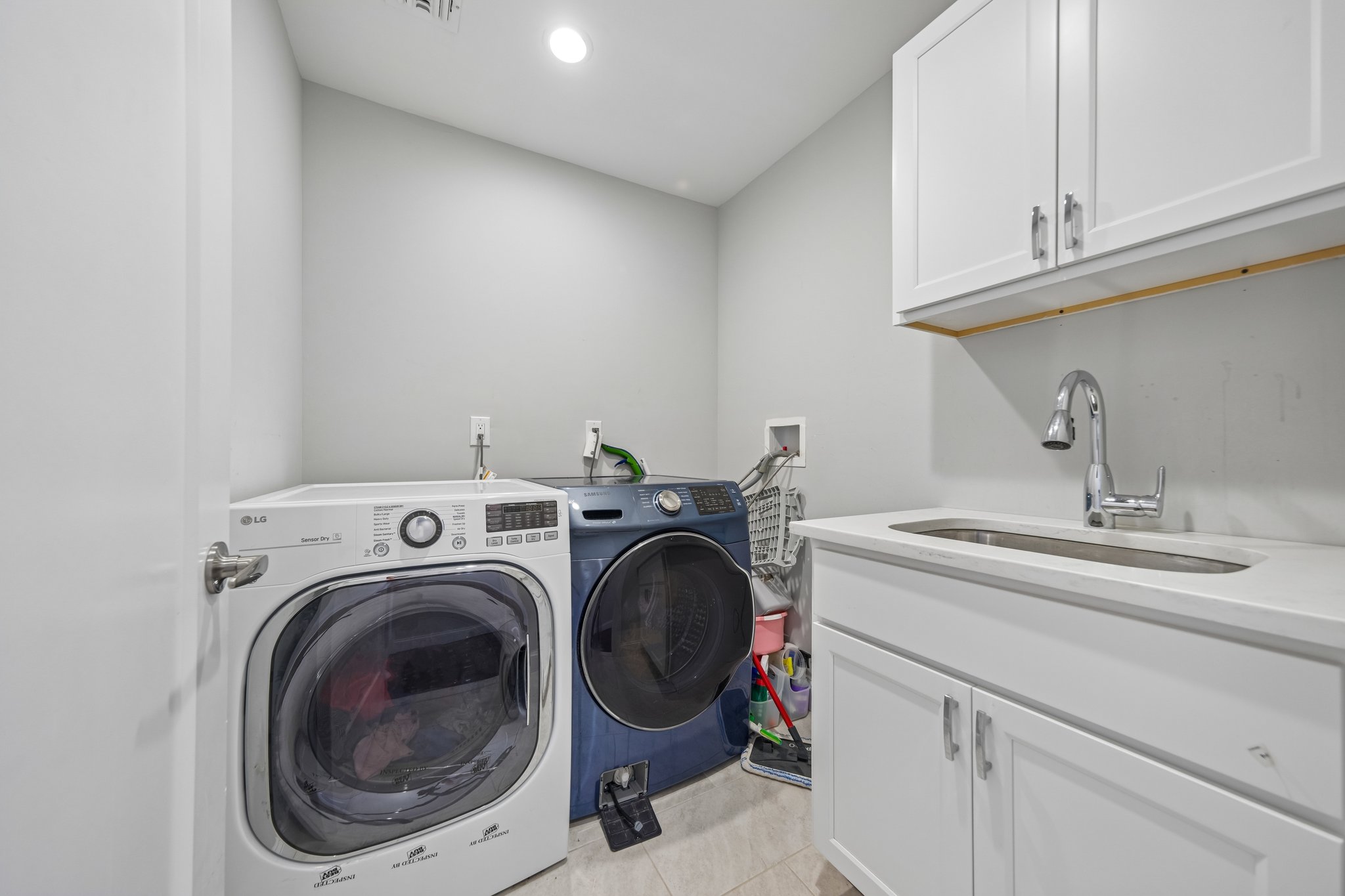 Full Laundry Room with Wash Sink