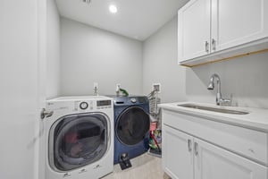Full Laundry Room with Wash Sink