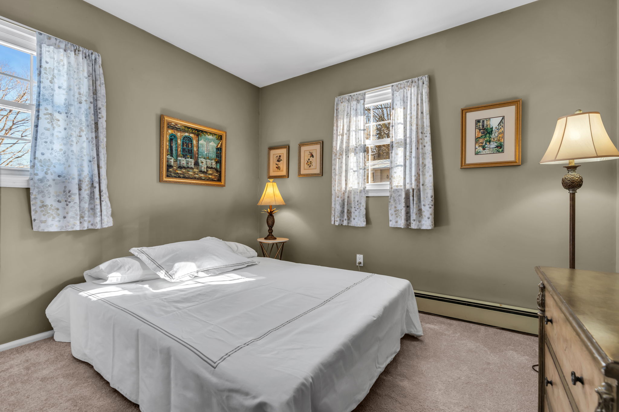 2nd bedroom, double closet, hardwood under carpet