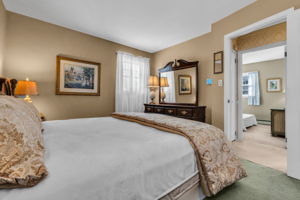 1st bedroom, deep closet, hardwood under carpet