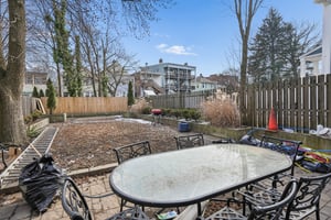 Patio and Yard; In season, the yard is a lovely green oasis with paver patio with use of outdoor furniture