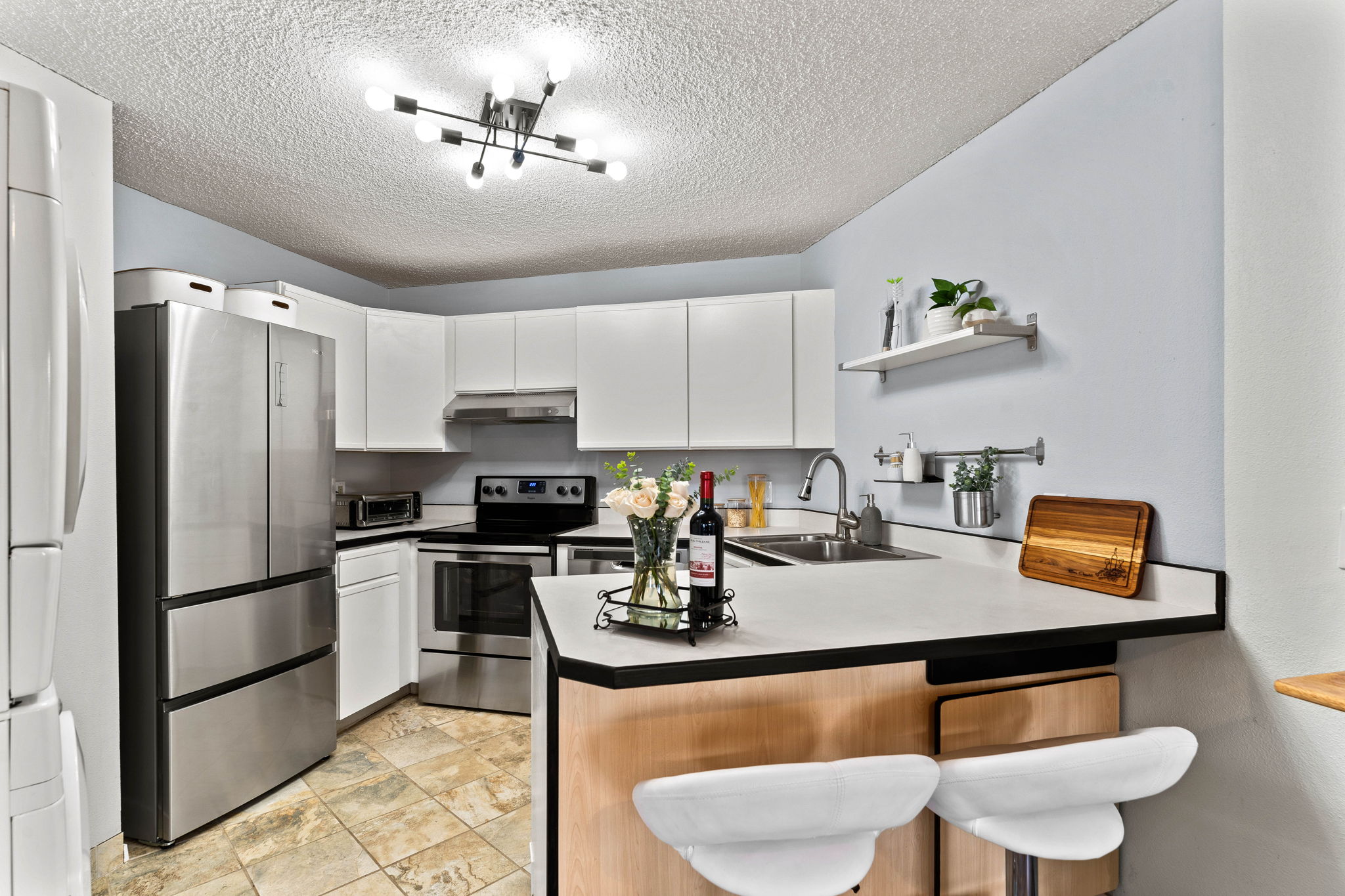 Kitchen featuring bar seating