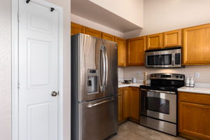 Kitchen with pantry closet.