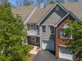 Interior townhouse in highly sought-after scenic Lake Cushetunk Woods. 1481 SF of thoughtfully designed living space, freshly painted in "Linen White creating a clean, versatile backdrop.