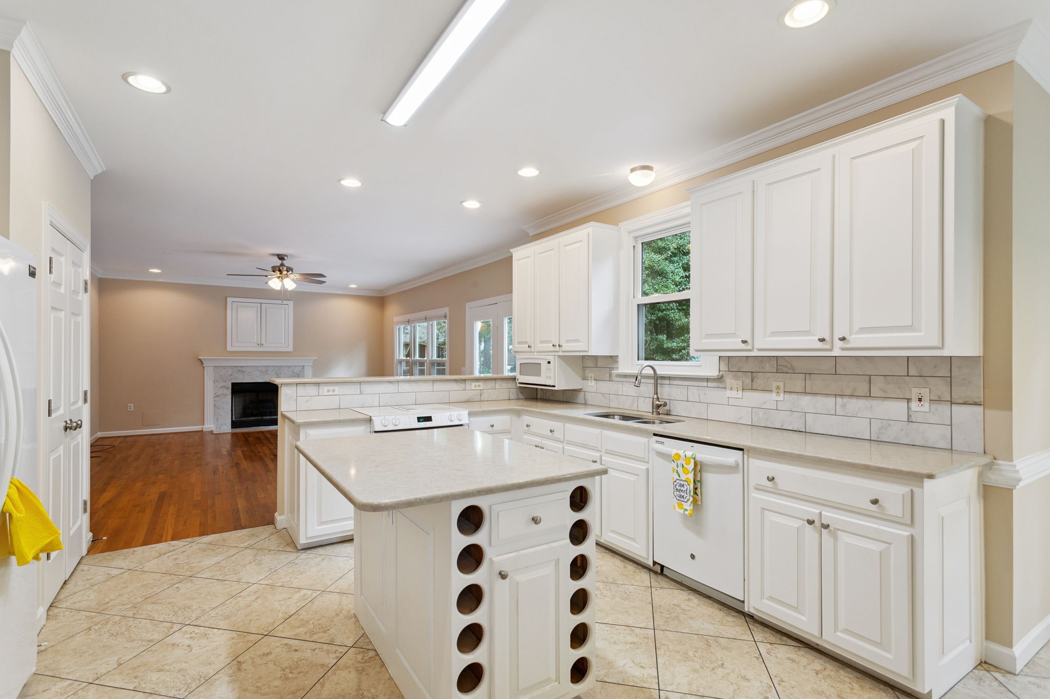 Lovely kitchen with abundant storage and counterspace.
