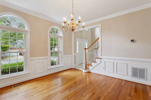 Formal dining room with great flow and natural light.