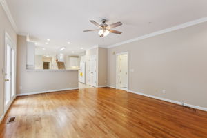 Expansive living space connects to the kitchen.