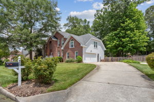 Large and deep driveway and 2-car garage.