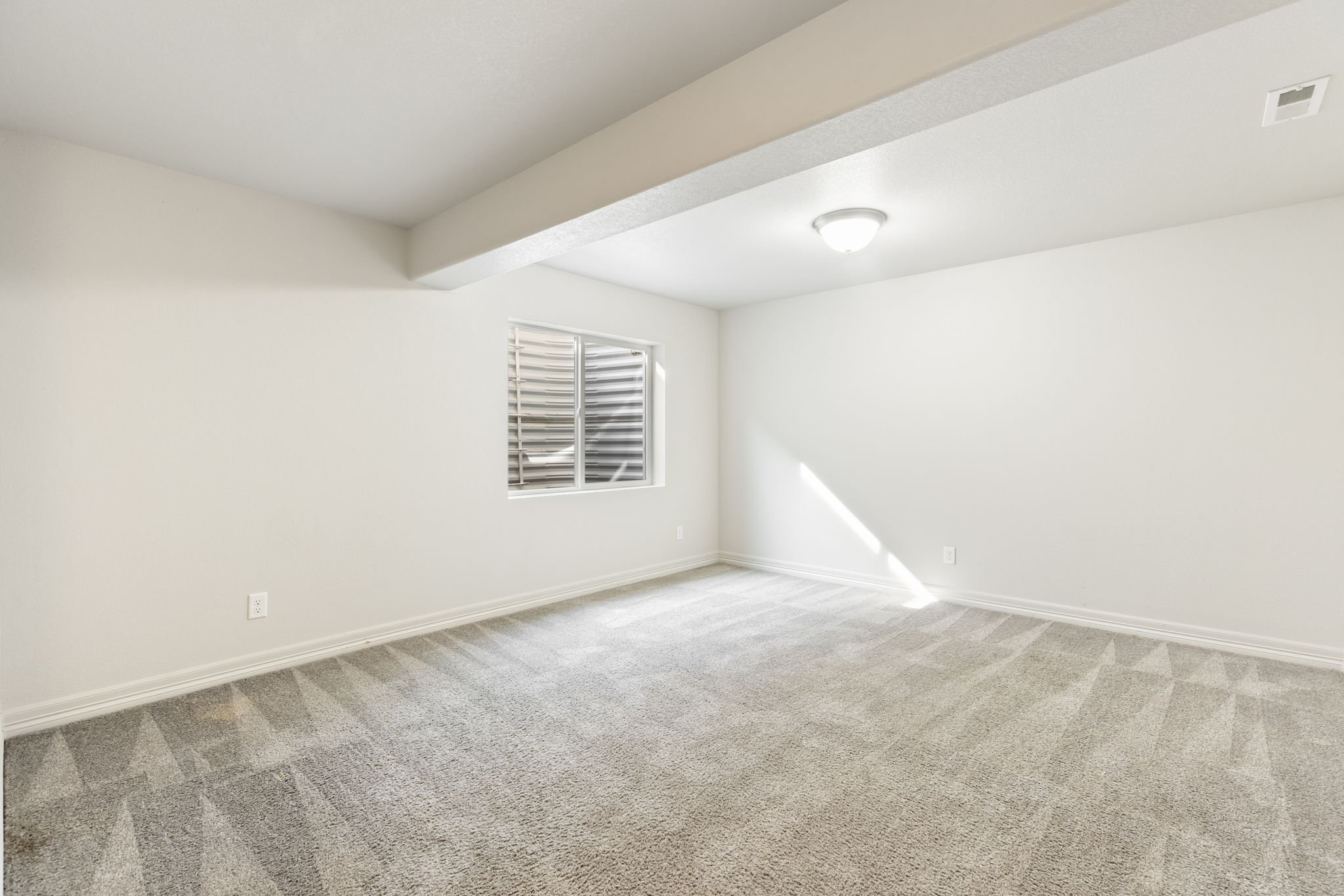 Basement bedroom 2 or bonus room featuring carpeted flooring and recessed lighting