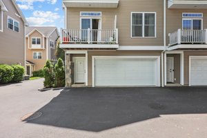 Custom Designed End-Unit w/2 Car Garage & Private Balcony