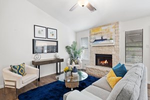 Floor to ceiling limestone fireplace