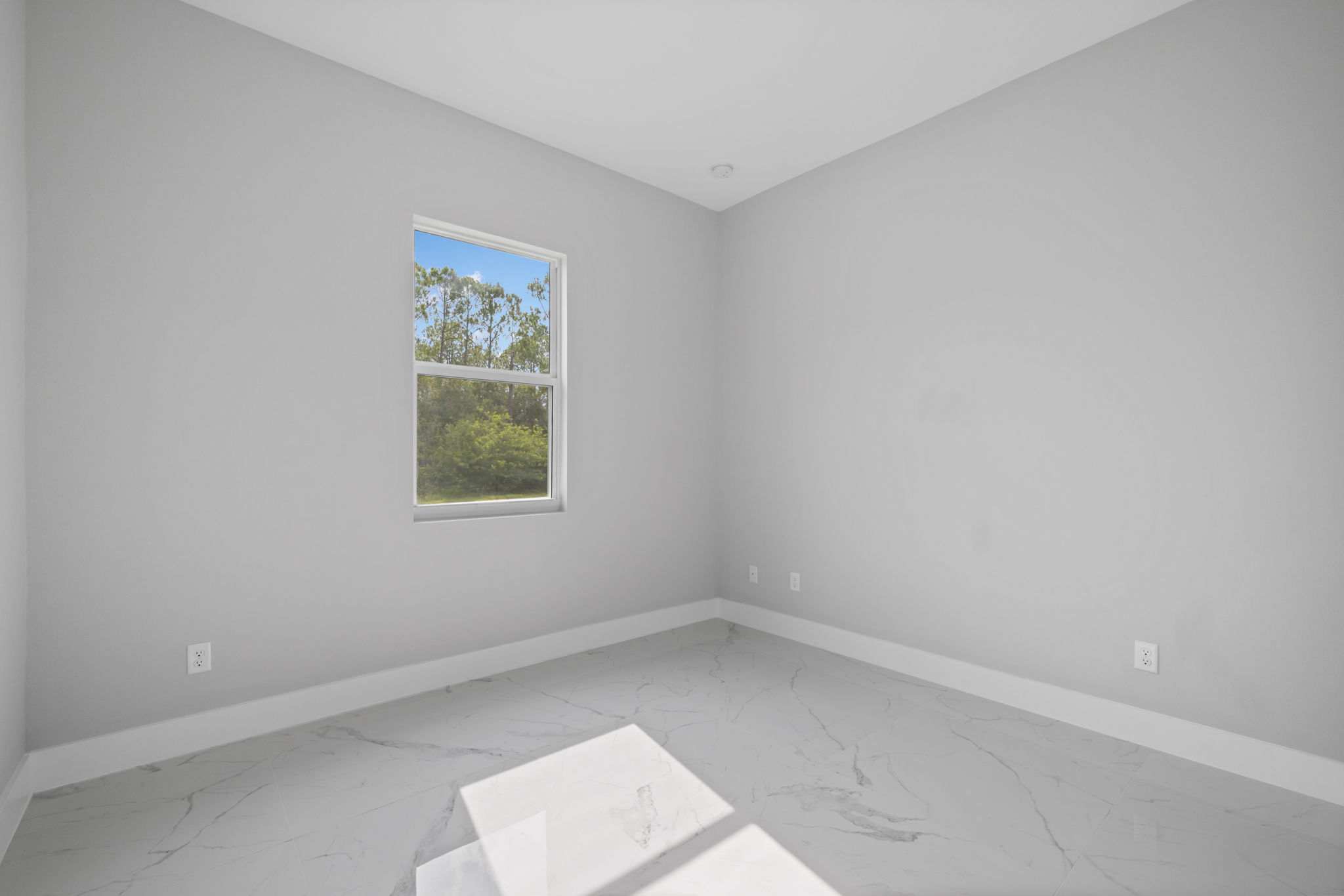 Guest Bedroom 2 - large window for abundant natural light