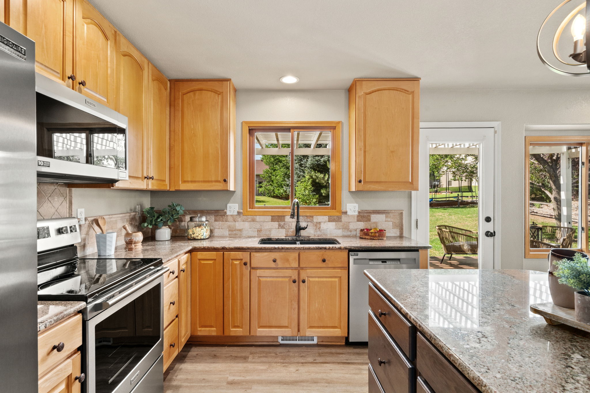 Stainless steel appliances all included. Granite counter tops, shaker cabinets, recessed lighting, and so many cabinets!