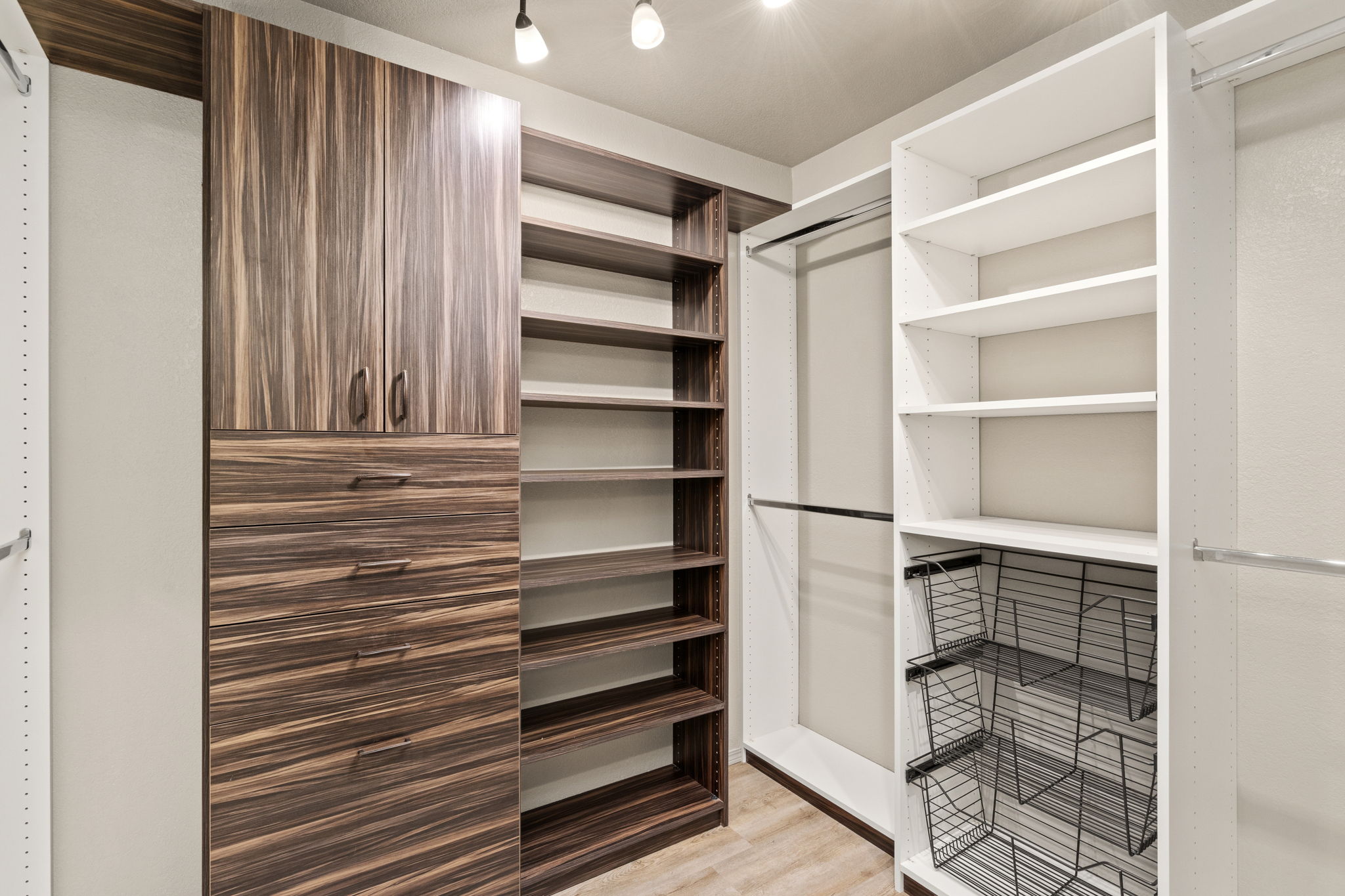 Custom primary bedroom closet organization