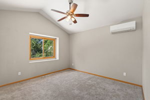 Two of the three upper level rooms have vaulted ceilings - one overlooking the front yard and one overlooking the backyard.