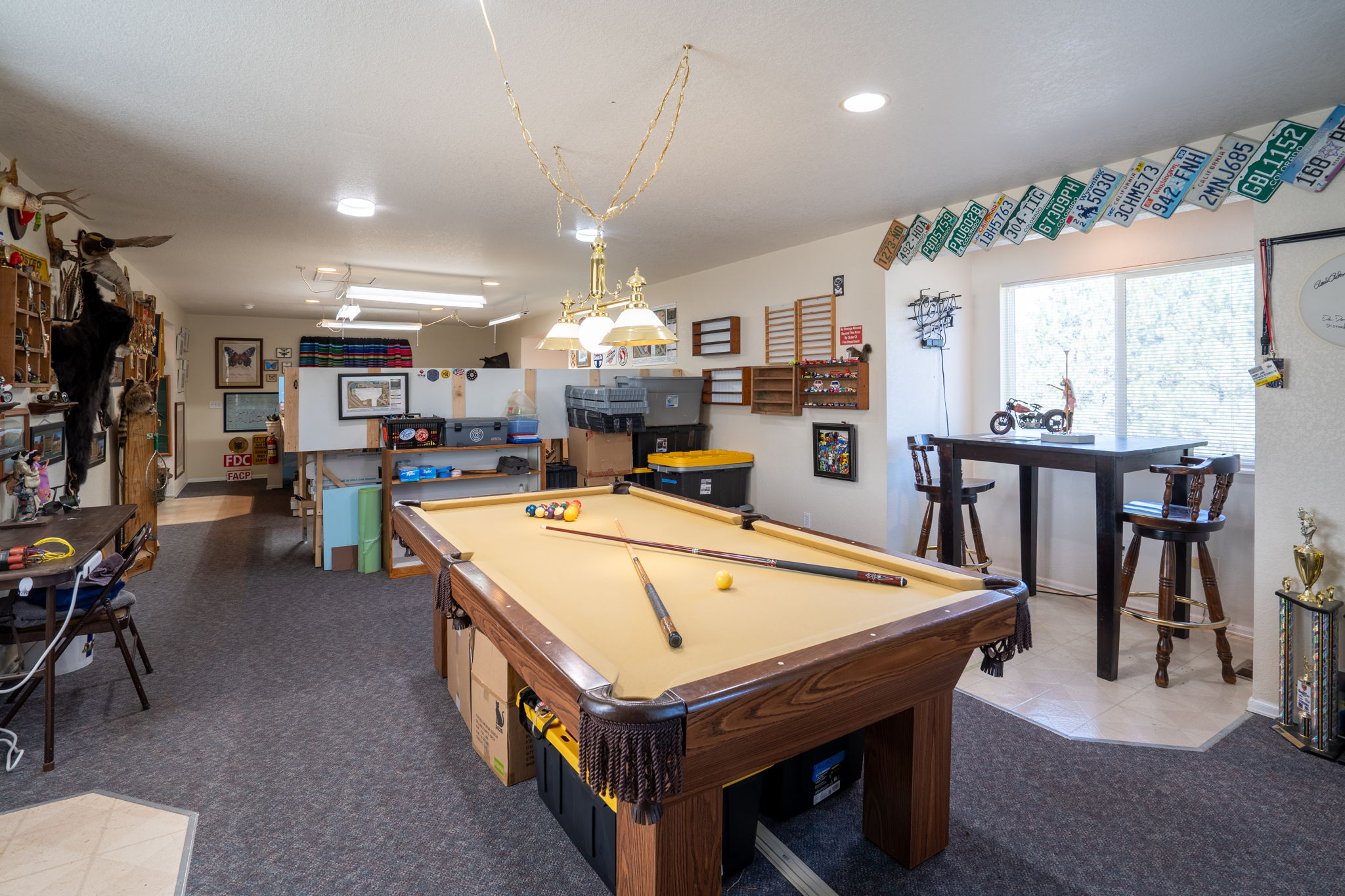 Upper floor private getaway perfect for a game room, home office, home gym or art studio.