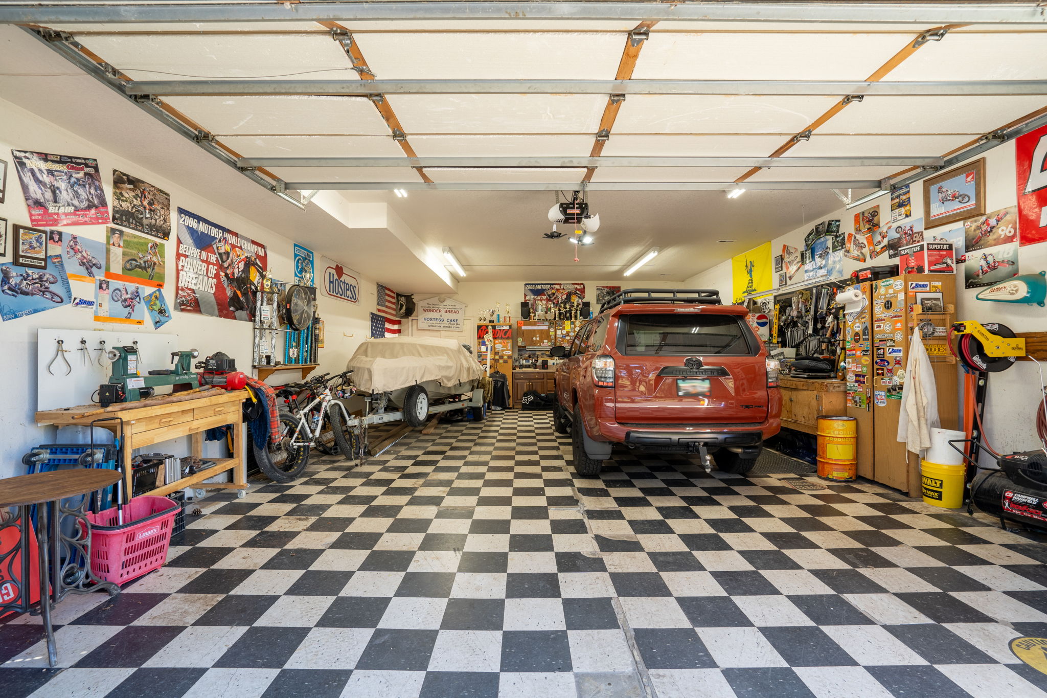 Detached 2 1/2 car garage/workshop with plenty of room for your cars and toys.